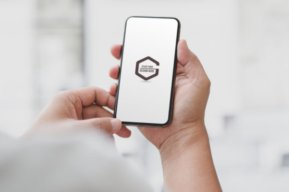 Download Business Man Holding Mock Up Smartphone - Business Collection